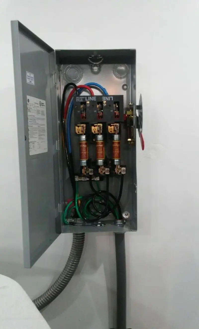 Three-phase disconnect switch installed for Smoke Detector Installation in Cooper